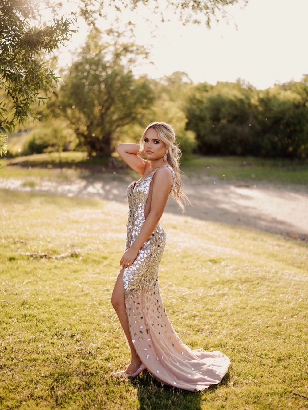 Silver/mirror Jovani Prom Dress Style #06561 with a flowing train